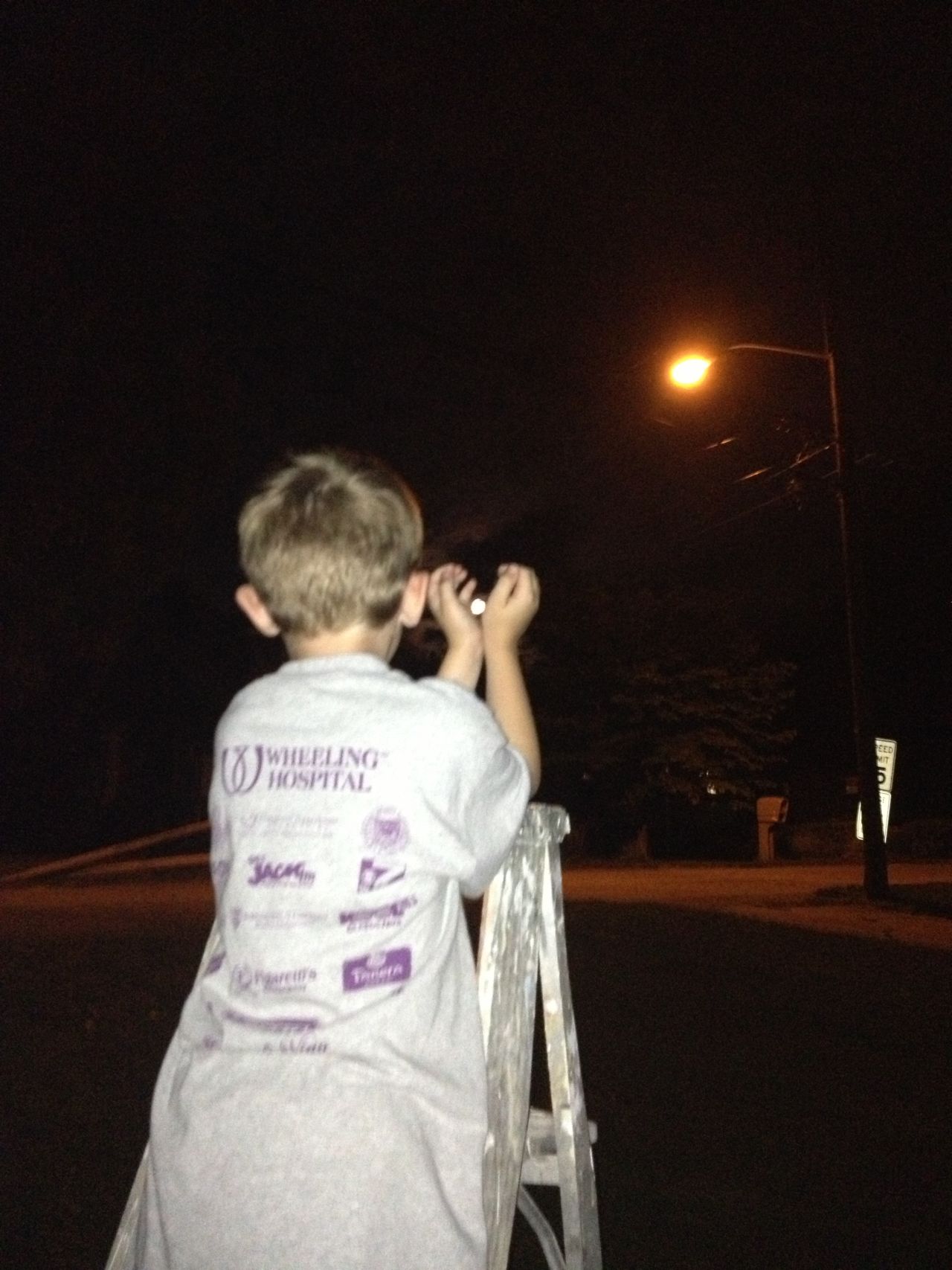 <a href="http://ireport.cnn.com/docs/DOC-994146">Jennifer Uhrig </a>photographed her son, Hayden, capturing the supermoon outside their home in Wheeling, West Virginia. As a science fan, Hayden talked about the supermoon all weekend, and later in the evening the pair went outside to reach for the moon. "Ten-thirty is pretty late for us, so it really turned into a giggle session as we tried to get the right shots," Uhrig said.