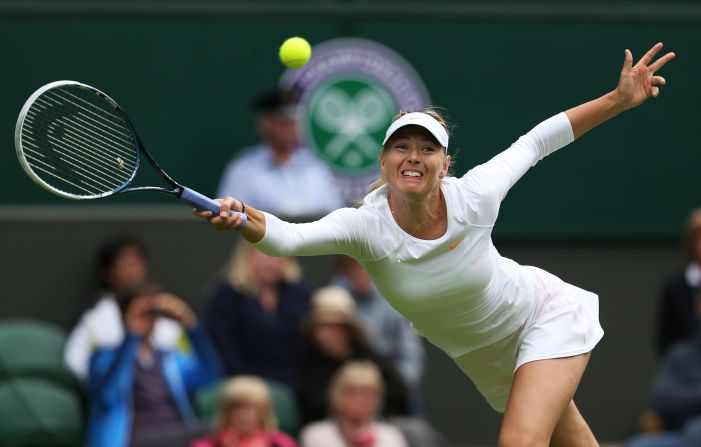 Maria Sharapova of Russia stretches for a forehand during her first-round match against Kristina Mladenovic of France on June 24. Sharapova won 7-6 (7-5), 6-3.