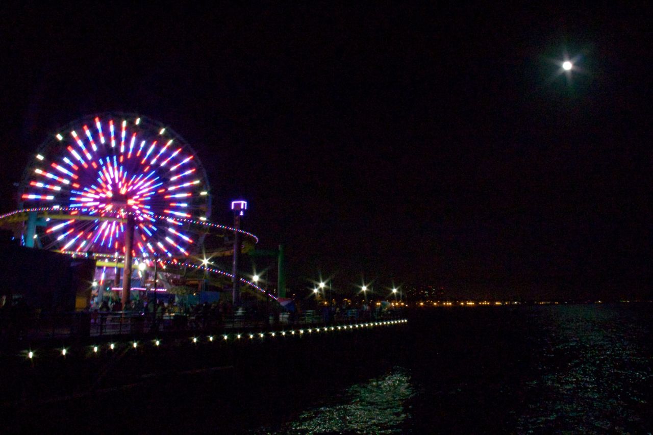 <a href="http://ireport.cnn.com/docs/DOC-994249">Andrew Rosenstein </a>was standing on the Santa Monica pier in California when he photographed the supermoon shining brightly next to a neon-colored ferris wheel. "I find it to be an important endeavor of science to understand the universe around us," he said.