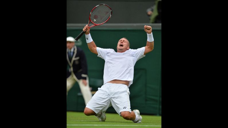 Australia's Lleyton Hewitt celebrates beating Switzerland's Stanislas Wawrinka on June 24.