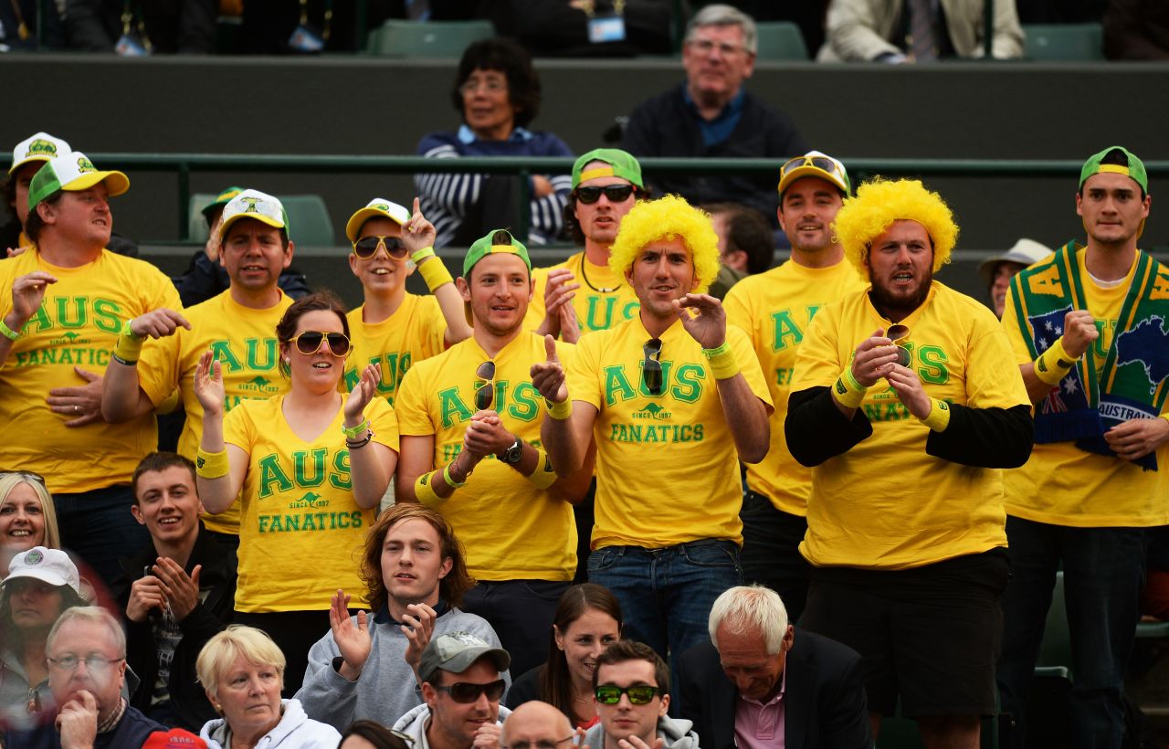 Australian fans cheer for Hewitt during his day one match against Wawrinka of Switzerland.