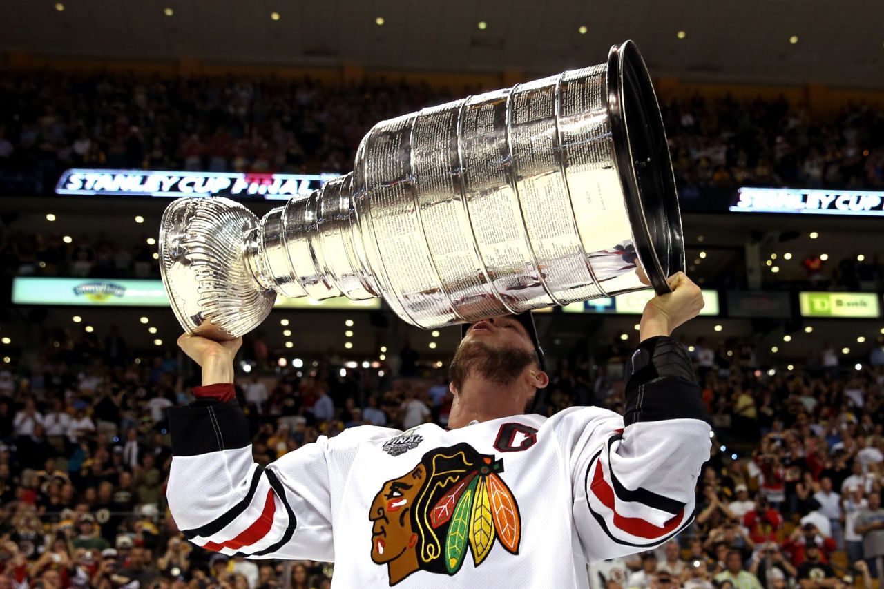 Jonathan Toews of the Chicago Blackhawks kisses the Stanley Cup after they defeated the Boston Bruins 3-2 in the NHL Stanley Cup Final in Boston on Monday, June 24. Chicago won the series 4-2.