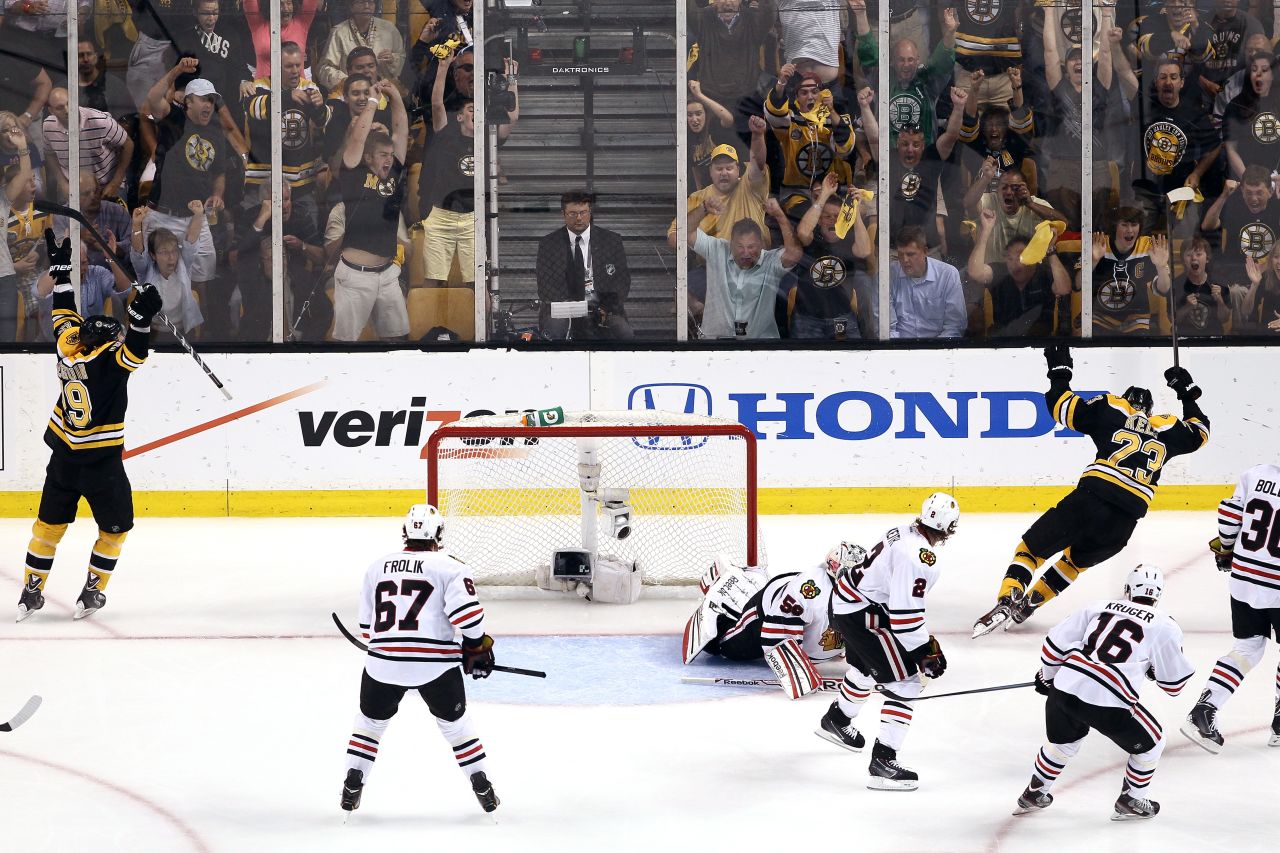 Chris Kelly of the Boston Bruins, right, celebrates with teammate Tyler Seguin after Kelly scored a goal in the first period.