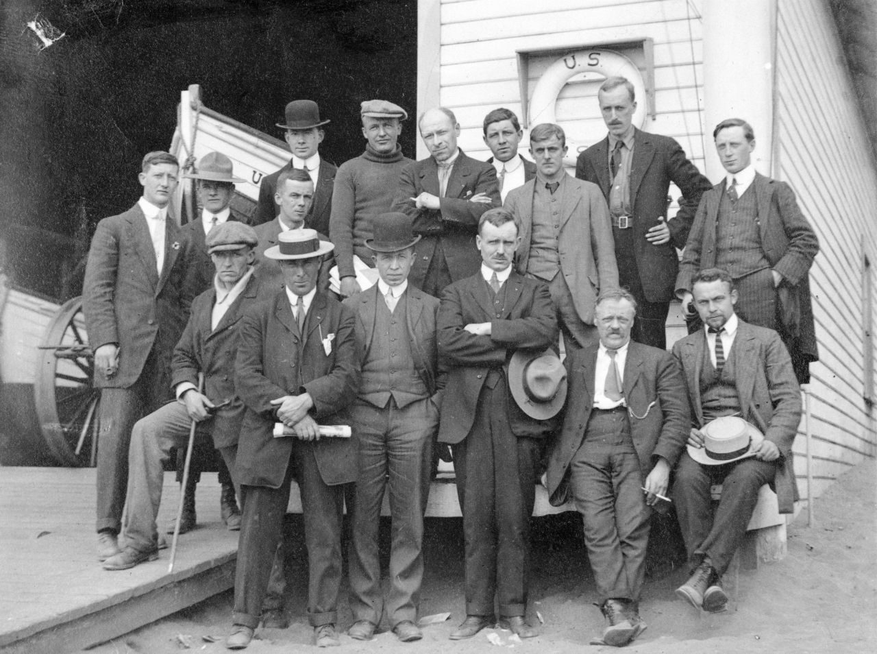 In this expedition photo which was taken before shipping out, Vilhjalmur Stefansson (front row, third from the left) was joined by his secretary Burt McConnell, (middle row, second from left) and the ship's captain, Robert Bartlett (front row, second from left). 