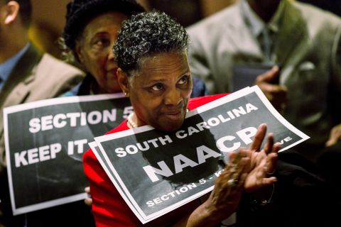 A supporter of the Voting Rights Act  rallies in the South Carolina State House in Columbia on February 26, 2013, the day before oral hearings at the Supreme Court.