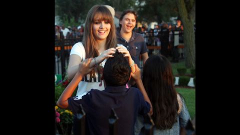 Paris and Prince speak with fans at a candlelight vigil held at Michael Jackson's childhood home in Gary, Indiana, in 2012.