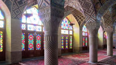 The columns, vaults, rugs and stained glass in this winter prayer hall at the Masjed-e Nasir-al-Molk Mosque in Shiraz create a serene atmosphere.