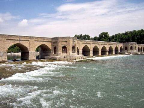 The 21-arch Chubi Bridge (1665) is another of the four historic bridges of Isfahan. The two pavilions were used by the king's court for private parties. <a href="http://edition.cnn.com/2013/06/26/travel/iran-time-for-travelers-to-return/index.html">Read the accompanying article.</a>