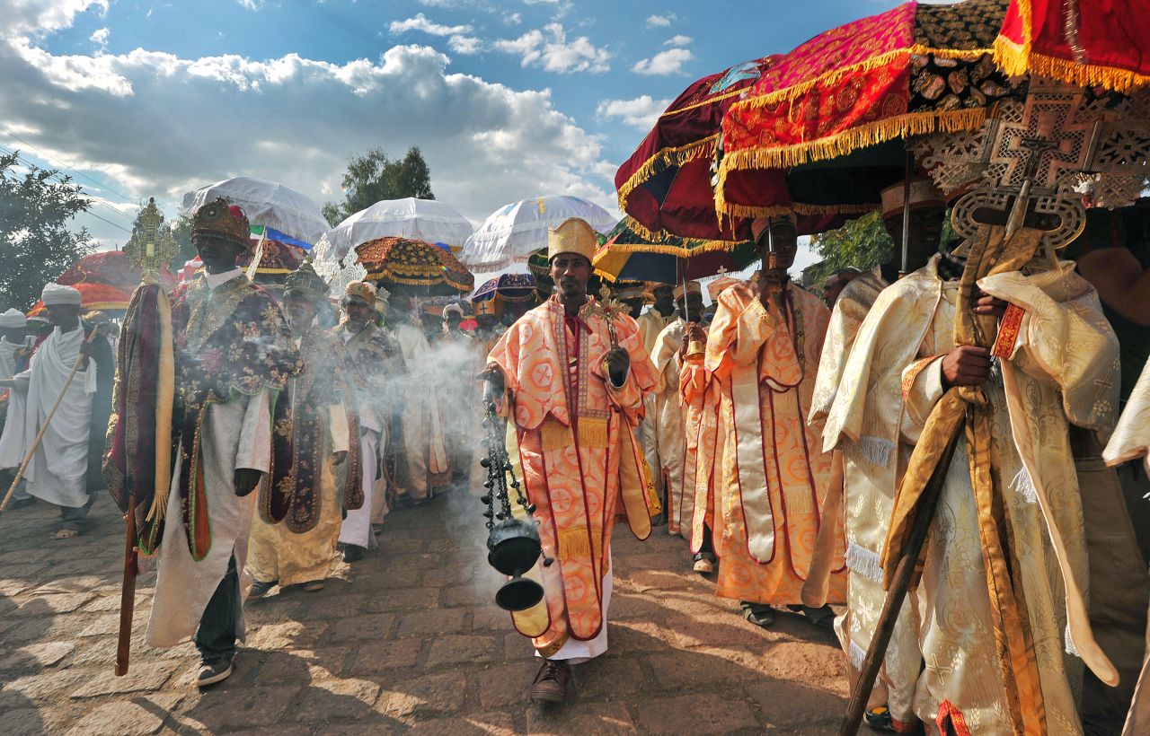 Priests and monks in Lalibela celebrate the Ethiopian Orthodox festival of Timkat, which remembers the Baptism of Jesus in the Jordan River. The Tabot, a model of the Ark of the Covenant is taken out of every Ethiopian church for 24 hours and paraded during a procession in towns across the country. Over 80 % of Ethiopians are estimated to be Orthodox Christians. 
