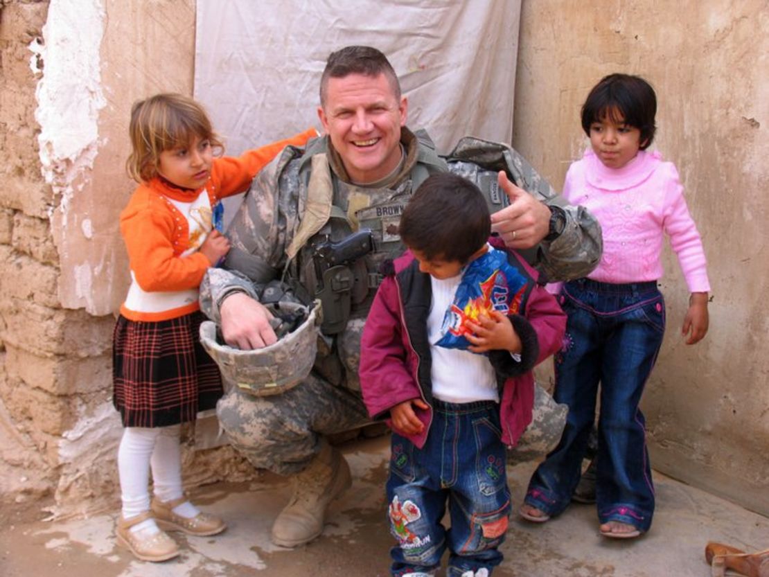 Col. Kevin Brown with Iraqi kids in Kirkuk in 2007. Brown helped  ensure Baby Noor came to the U.S. for medical help.