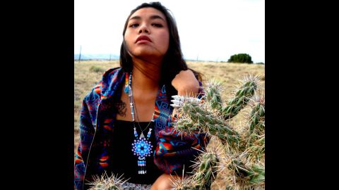 Paul Frank Industries is collaborating with four Native American artists on a limited edition line of clothing and accessories, set to debut in August.<br /><br />Autumn Dawn Gomez is a jewelery designer from the Comanche/TaosPueblo/Navajo tribes. For "Paul Frank Presents" she is designing accessories influenced by various landscapes that have impacted her life. Gomez is seen here wearing a medallion she created using hama fuse beads. 