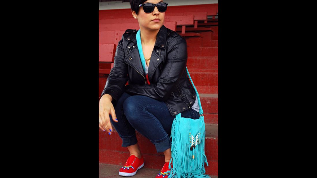 Candace Halcro is an accessories designer from the Plains Cree/Metis tribe. She is skilled in Native American beading and <a href="http://www.etsy.com/people/brownbeadedcom" target="_blank" target="_blank">specializes in sunglasses</a>. Halcro will be applying her beading craft to Paul Frank sunglasses for the collection. She's seen here wearing beaded shoes, a purse and sunglasses that she created. 