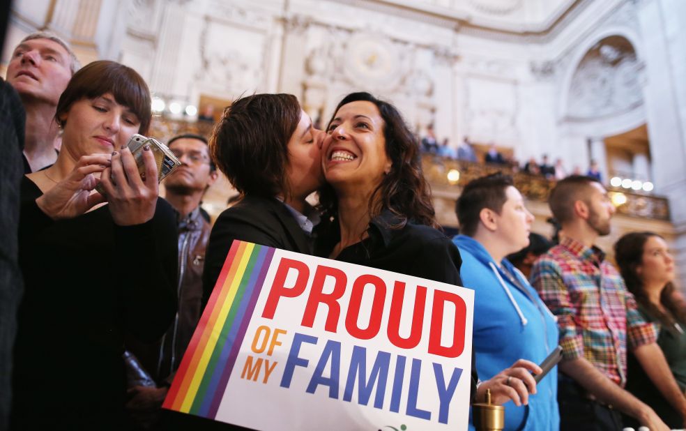 A couple celebrates at San Francisco City Hall upon hearing about the U.S. Supreme Court rulings on same-sex marriage on June 26, 2013. The high court cleared the way for same-sex couples in California to resume marrying after dismissing an appeal on Proposition 8 on jurisdictional grounds. The court also struck down a key part of the Defense of Marriage Act, a 1996 federal law defining marriage as between a man and a woman. 