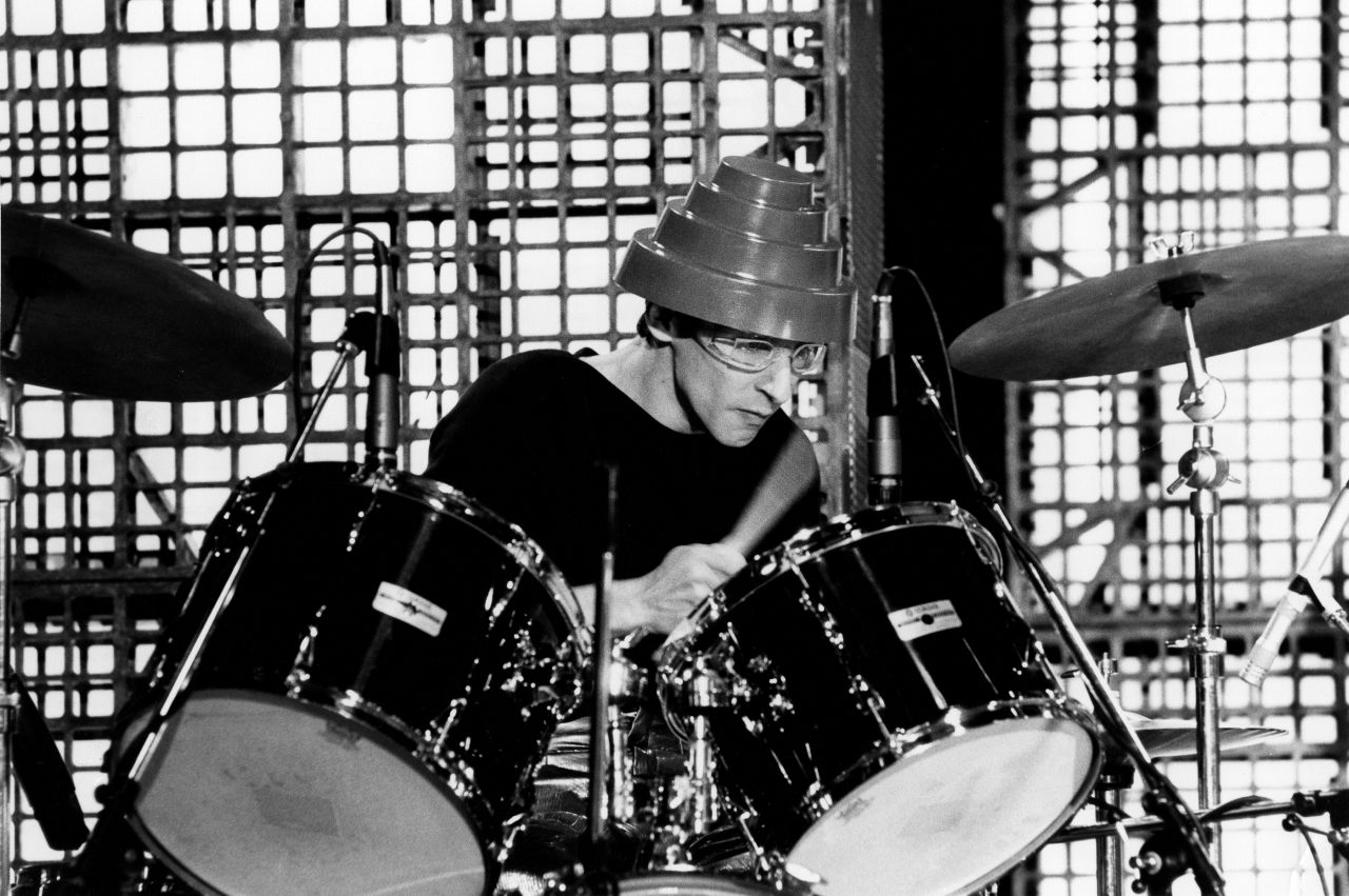 Alan Myers, Devo's most well-known drummer, <a href="http://clubdevo.com/index.php?option=com_k2&view=item&id=4689:devo-mourns-passing-of-alan-myers&Itemid=27" target="_blank" target="_blank">lost his battle with cancer</a> on June 24. Band member Mark Mothersbaugh said in a statement that Myers' style on the drums helped define the band's early sound.