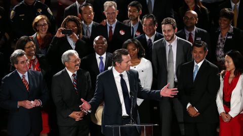 California Lt. Gov. Gavin Newsom speaks during a rally in San Francisco after the Supreme Court decisions were announced.