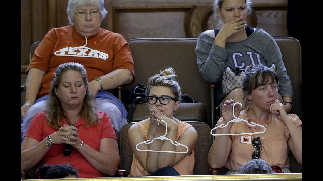 Opponents of the bill sat in the gallery holding hangers. Among the changes Davis and others opposed: requiring abortion clinics to become ambulatory surgical center and requiring doctors who perform abortions to have admitting privileges at nearby hospitals.