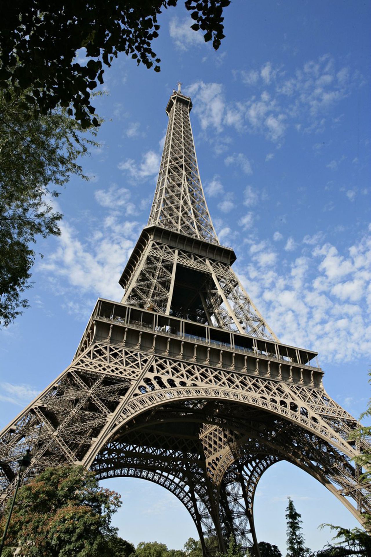 Temperature alters the height of the Eiffel Tower by up to 6 inches (15 centimeters) over the year.<br />The Eiffel Tower weighs 13,200 tons and was the first building to surpass the height of the Great Pyramid of Giza. It remained the world's tallest building until 1929, when New York's Chrysler Building took the top spot. Gustave Eiffel's initial building plans and calculations were so precise that no revisions had to be made during the construction process. <strong>Completion date:</strong> March 31, 1889.