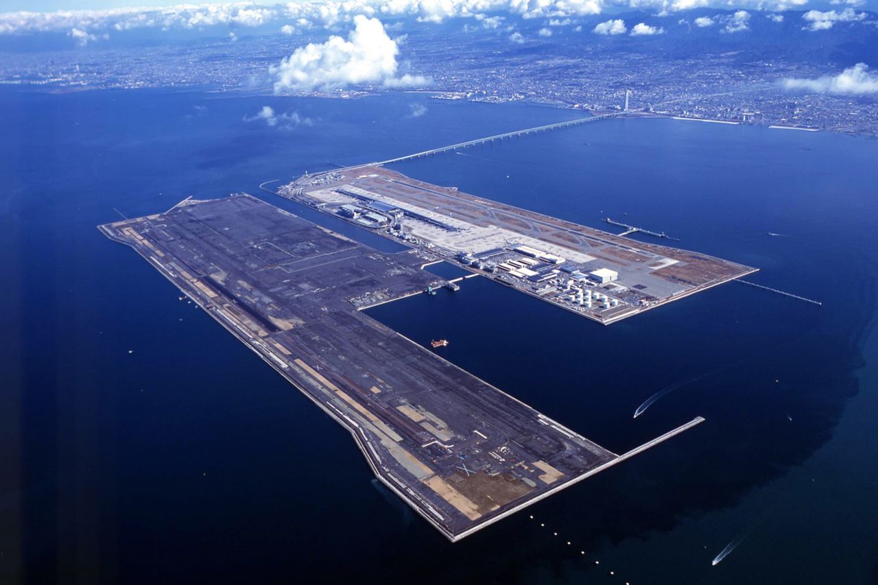 Kansai International Airport was the first airport to be built on an artificial island.<br />Osaka is one of Japan's most crowded cities, so when a new airport was called for, engineers came up with a novel solution -- a man-made island. Construction of the island, which measures four kilometers (2.5 miles) by 2.5 kilometers (1.6 miles) took three years. Some 10,000 workers and 80 ships were used to excavate 21 million cubic meters of landfill and the island's construction became the world's most expensive civil engineering project, with a total cost of $20 billion. <strong>Completion date:</strong> 1994.