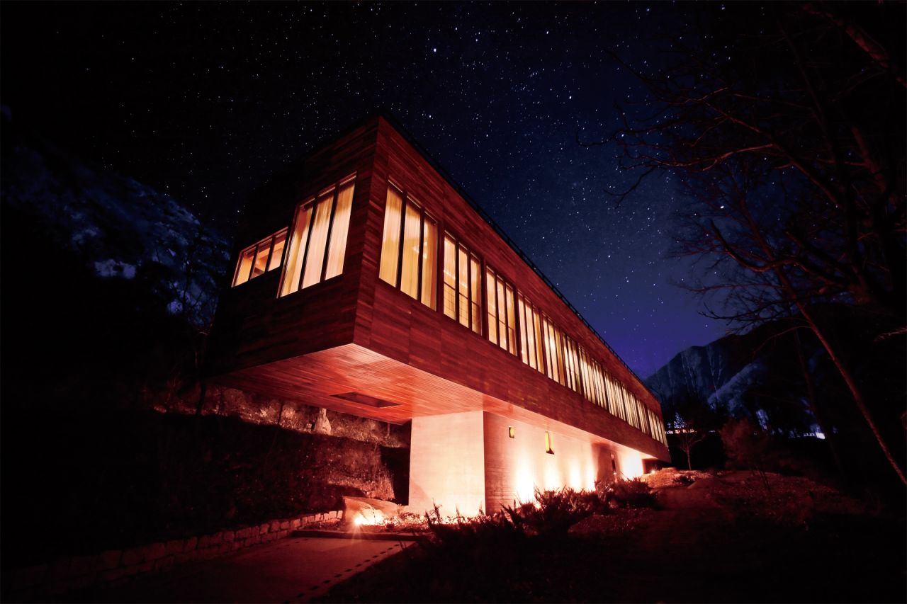 SOHO China's development Commune by the Great Wall is a collection of 42 villas by 12 Asian architects with a private pathway to the Great Wall of China. This villa is called Suitcase House by Hong Kong architect Gary Chang.