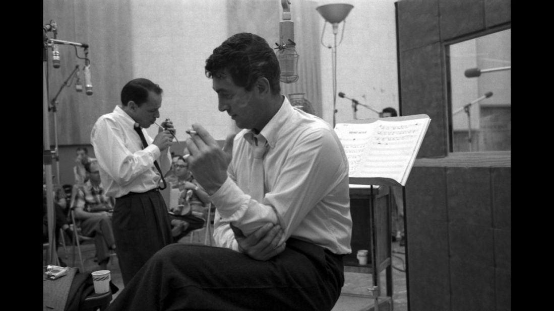 Sinatra and Martin take a cigarette break during the recording of Sleep Warm in 1958. The album was re-released in 1963 with a much more direct title: Dean Martin Sings/Sinatra Conducts.