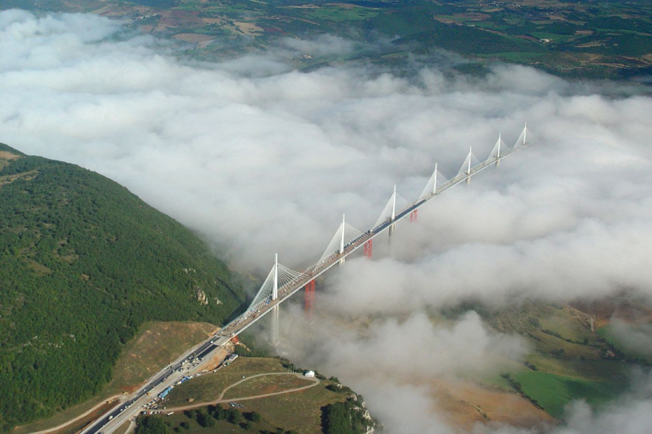 The Millau Viaduct has the highest road bridge deck in Europe -- it sits 270 meters (890 feet) above the Tarn river at its highest point.<br />The Millau Viaduct is the world's tallest bridge, with a total height of 343 meters (886 ft), making it taller than the Eiffel Tower. The viaduct, which crosses the valley of the river Tarn, was created to ease traffic on the route between Paris and Spain. It cost €320 million ($412 million dollars) but offers good value for money, with a lifespan of 120 years. <strong>Completion date:</strong> December 16, 2004.
