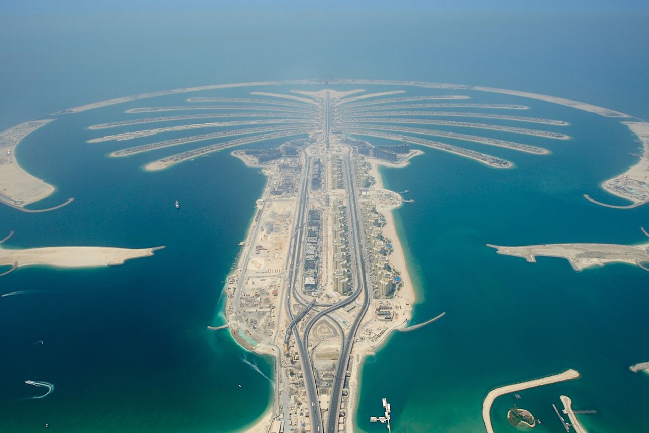 The Palm islands comprise approximately 100 million cubic meters of rock and sand. <br />In total, 210 million cubic meters of rock, sand and limestone were reclaimed (through dredging) to create the islands, with 10 million cubic meters of rock used in the outer ring alone. The rocks used for both islands were transported from 16 quarries throughout the UAE and the materials used are enough to build a wall that could circle the world three times. <strong>Completion date:</strong> September 24, 2008.