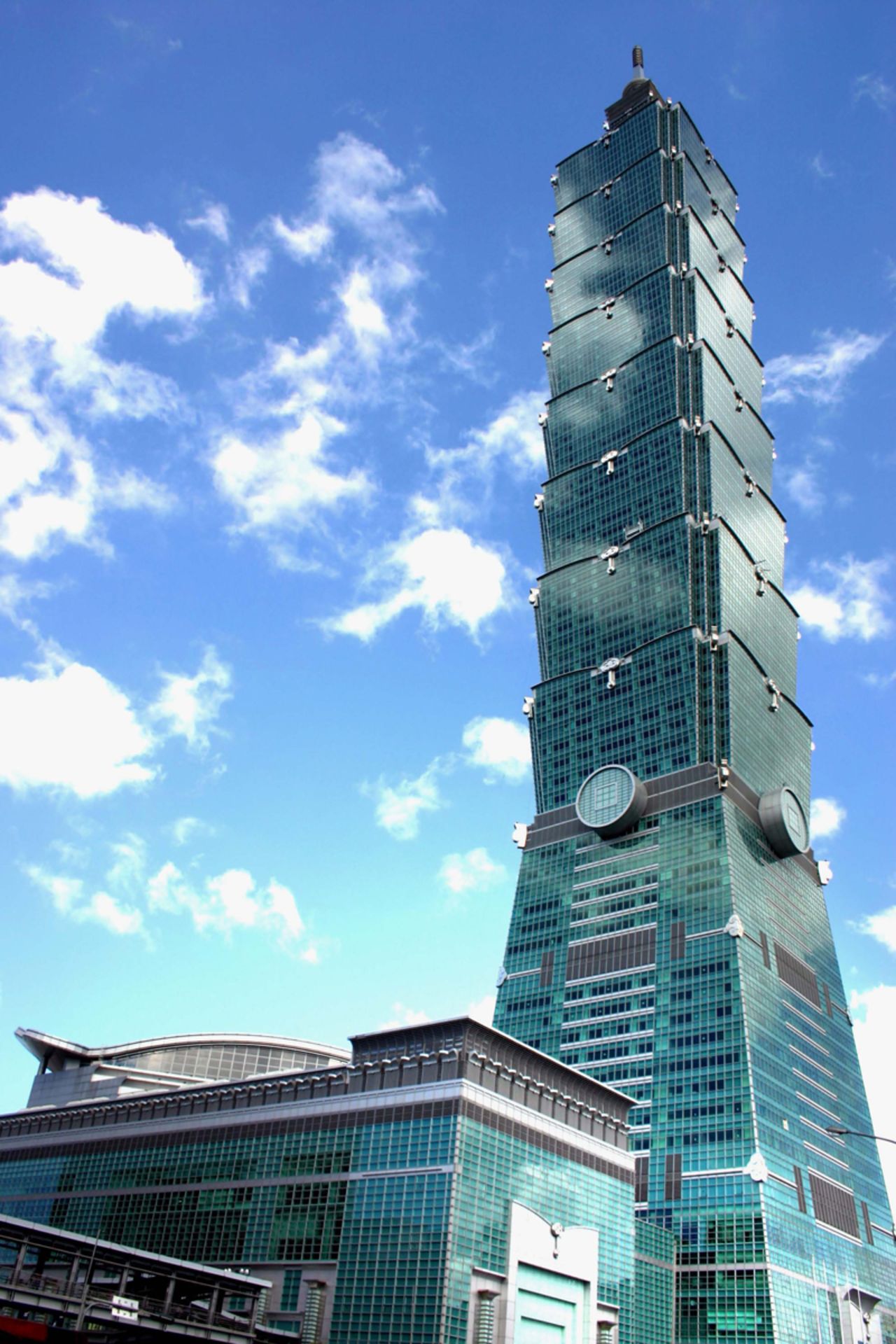 <strong>Fast fact:</strong> Taipei 101 was the first building in the world to break through 500 meters.<br />Upon its completion, the tower claimed several records: it had the world's fastest elevator, was the world's tallest building and was the world's tallest structure, thanks to its spire. Eight "mega-columns" make the building especially earthquake resistant. <strong>Completion date:</strong> December 31, 2004. 