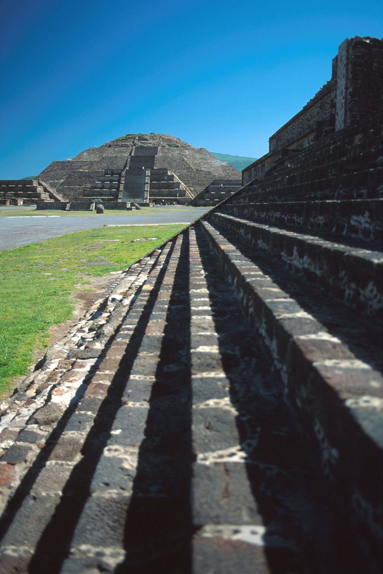 Teotihuacan is an Aztec name meaning "the place where men become Gods."<br />It was the largest city in the pre-Columbian Americas. The most famous structure is the Pyramid of the Sun, which was built in two phases. The second phase took its height to 224 meters, making it the third-tallest pyramid in the world. The entire city originally covered around 20 square kilometers (eight square miles) and was home to 2,200 structures, built with stone and lime plaster. <strong>Completion date:</strong> 100 BC.