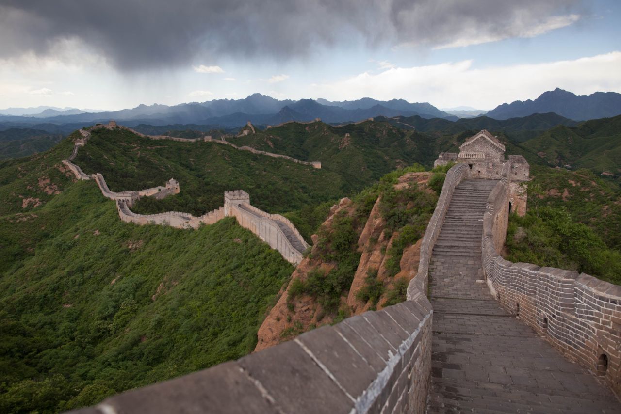 The Great Wall of China is 8,850 kilometers long (5,500 miles) and was constructed over a period of 2,000 years. Construction began in 475 BC, to protect China from the invading Huns. During the Ming dynasty, between 1368 and 1644 A.D, it was given a makeover, with the addition of watchtowers, battlements and cannons -- some of which stand 980 meters above sea level. The mortar used to bind the stones of the wall is made from rice flour. <strong>Completion date:</strong> 204 BC.