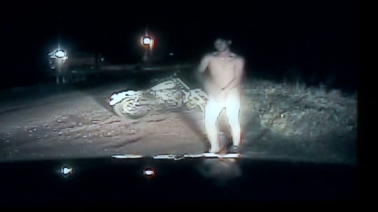 Man rides naked on a motorcycle