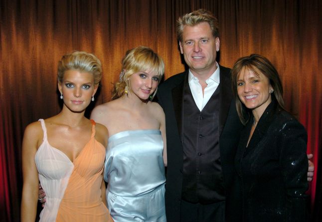 Jessica and Ashlee Simpson pose with their parents, Joe and Tina Simpson. Joe, who became better known as "Papa Joe" to fans of Jessica's former reality show "Newlyweds," has managed both his daughters. Joe and Tina finalized their divorce in April 2013 after 34 years of marriage.