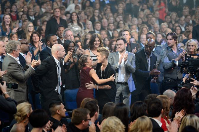 Singer Justin Bieber and his mother, Pattie Mallette, share a hug at the American Music Awards. Mallette released a book in 2012 titled "Nowhere but Up: The Story of Justin Bieber's Mom" that chronicled her rise from being a teen mom with drug and alcohol addiction.