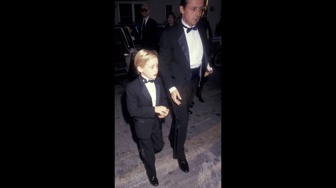 Macaulay Culkin and father Kit Culkin arrive at the 17th Annual People's Choice Awards in 1993. At 16, the "Home Alone" star filed for and won emancipation from his parents, accusing them of financial mismanagement.