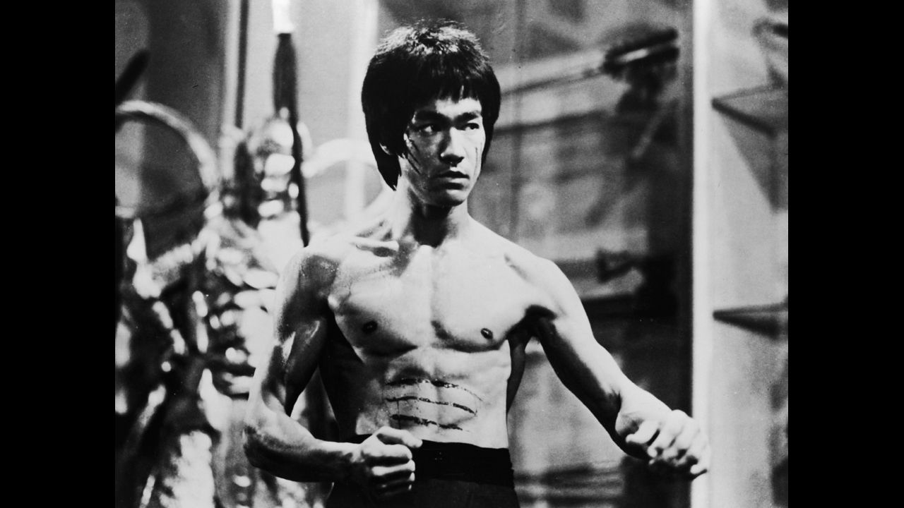 Bruce Lee's iconic jumpsuit fetches $100,000 at auction | CNN
