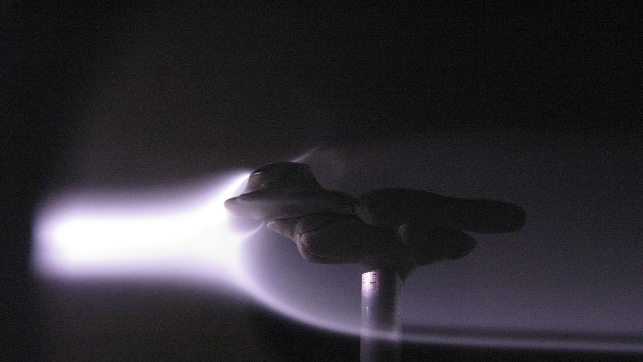 A model with the mini-magnetosphere shield is tested in a plasma stream.