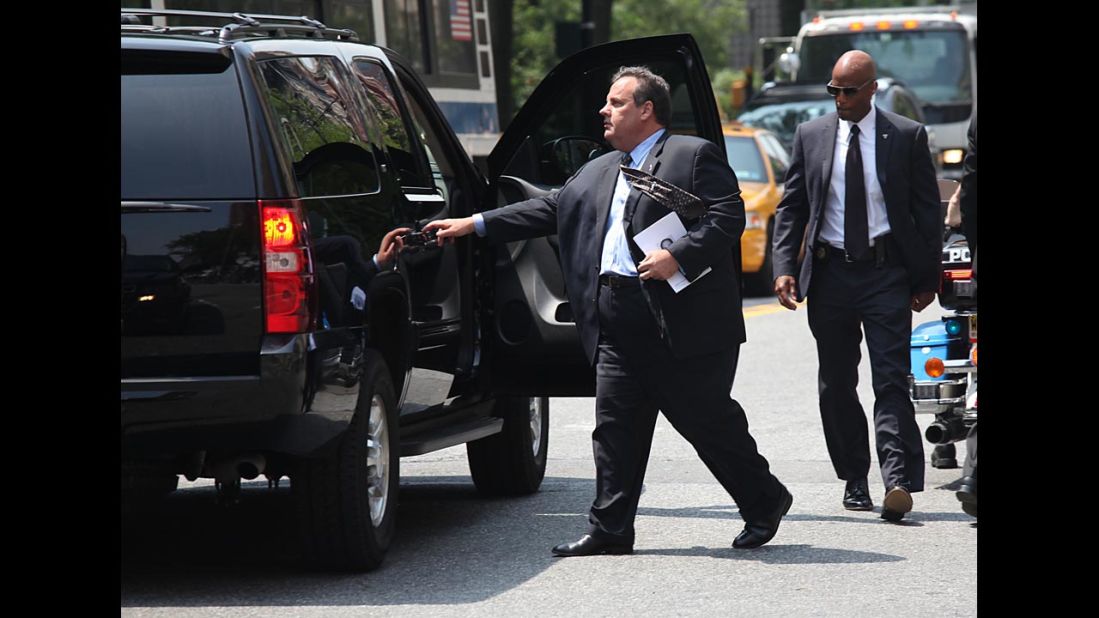 New Jersey Gov. Chris Christie departs the funeral.