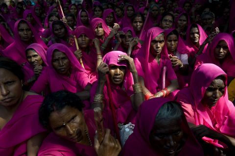 Members of the Gulabi Gang participate in a protest in New Delhi on September 17, 2009. The social justice and women's rights group is known for donning pink saris.
