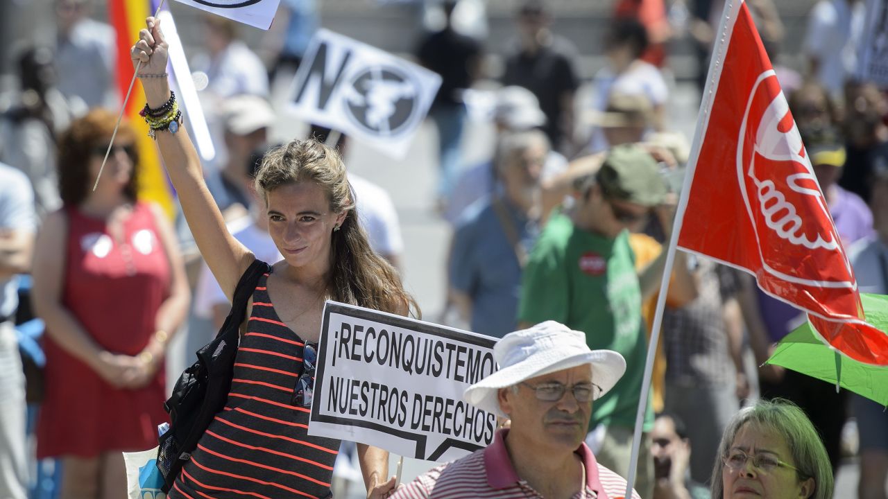 People attend a demonstration in Madrid on June 16, 2013 against austerity policies and record high unemployment.