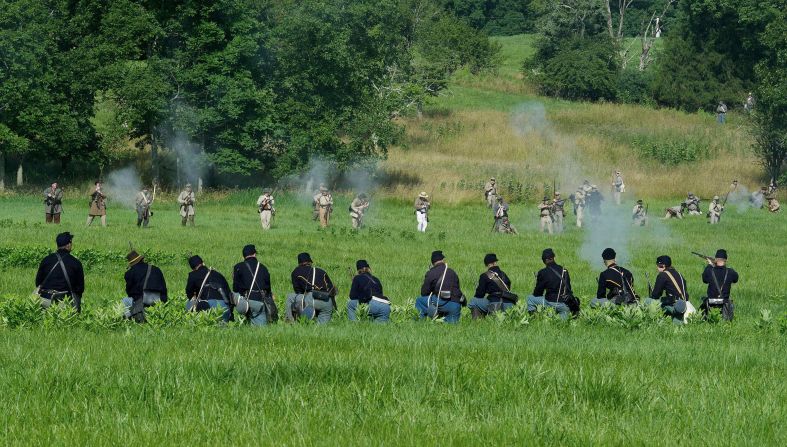 Union soldiers are fired on by advancing Confederate troops. "People are here to recognize and honor and commemorate what these people went through, the sacrifices of both soldiers and civilians," said an official with the Blue Gray Alliance, which put on the event.