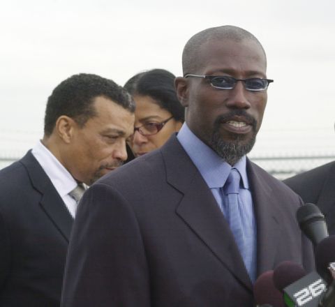<a href="http://www.cnn.com/2013/04/05/showbiz/wesley-snipes-released" target="_blank">Wesley Snipes</a> was helped by Smith, seen here in the background, during his tax fraud problems in 2006.