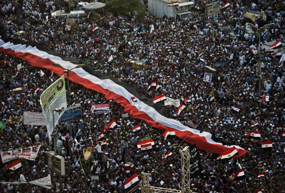 Morsy supporters demonstrate in Cairo on June 28.  Protests also erupted in Suez, Sharqia, El Monofia and Gharbiya, the state-run Ahram news agency said. And in the port city of Alexandria, so many people turned out that traffic virtually came to a standstill.
