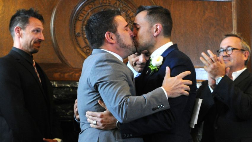 Paul Katami, left, and Jeff Karrillo kiss at their wedding in Los Angeles on June 28, 2013. Katami, Zarrillo and the other two plaintiffs in the U.S. Supreme Court case that overturned California's same-sex marriage ban were married June 28, after a federal appeals court freed gay couples to obtain marriage licenses in the state for the first time in 4 1/2 years.