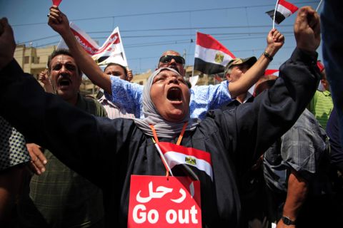 Morsy opponents protest outside the presidential palace in Cairo on June 30.