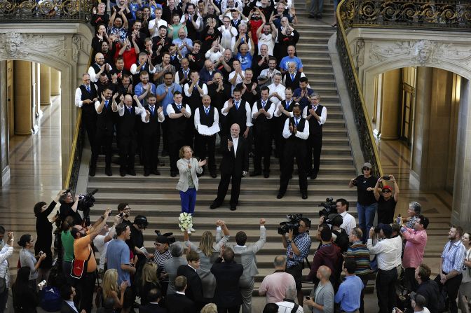 A chorus sings for newlyweds at City Hall in San Francisco on June 28.