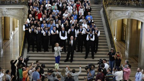 A chorus sings for newlyweds at City Hall in San Francisco on June 28.