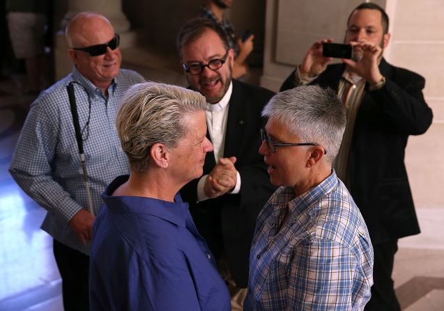 Suzanne Hufft, left, and Val Robb exchange vows as they are married at San Francisco City Hall on June 28.