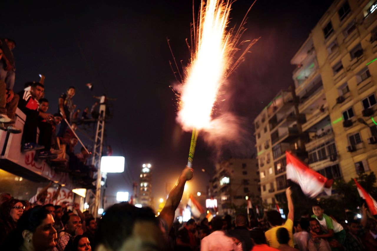 Protesters set off fireworks on June 30 outside the presidential palace. 
