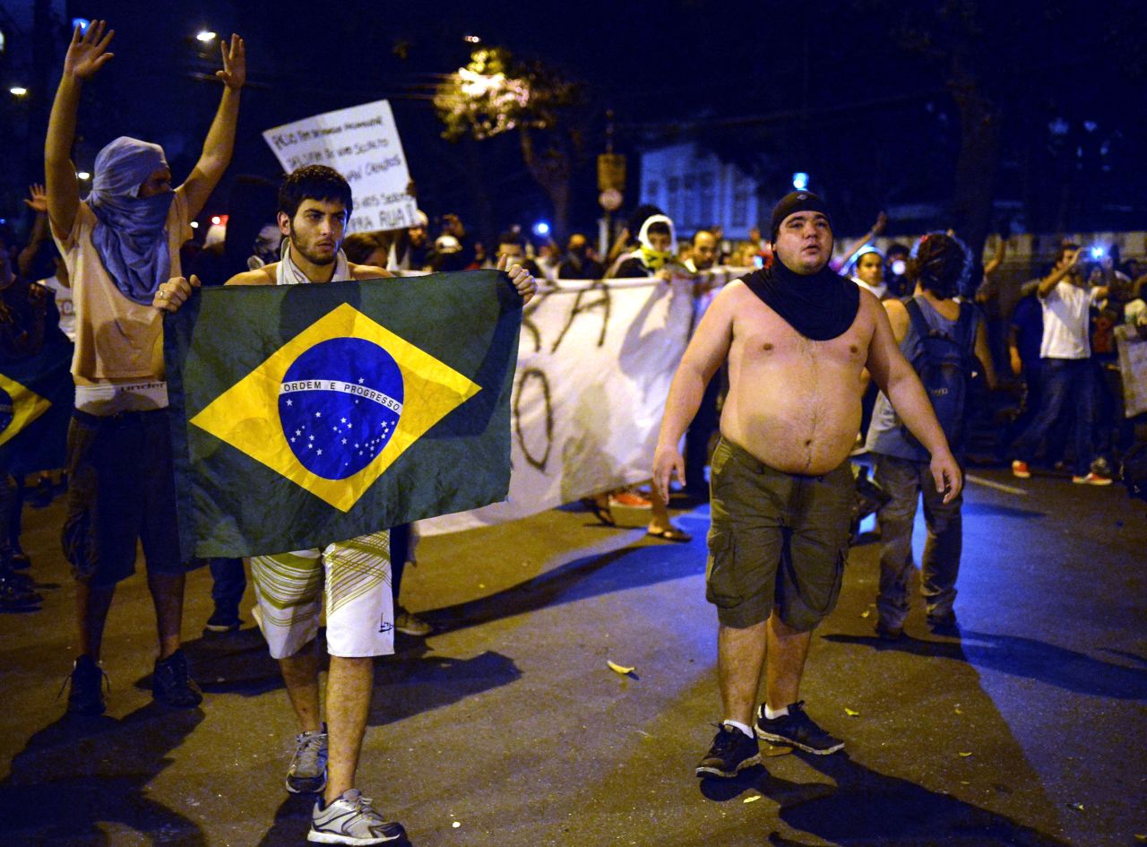 The mood on the streets of Rio de Janeiro remained hostile as Brazil and Spain took to the pitch.