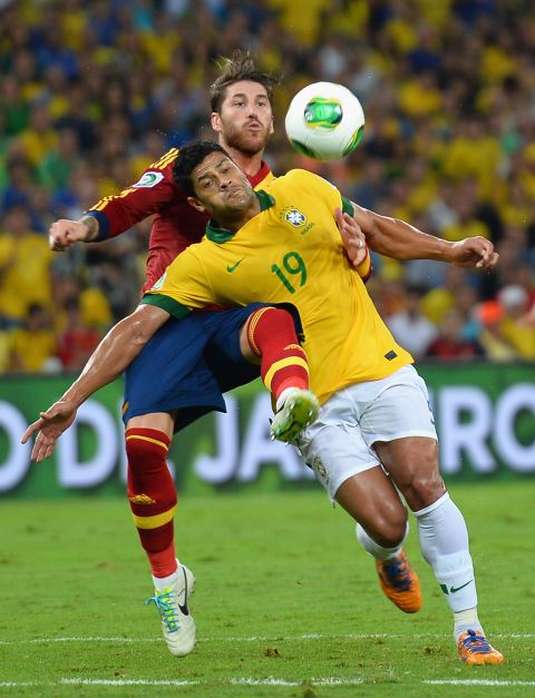 Hulk of Brazil and Sergio Ramos of Spain compete for the ball in a match the hosts dominated.