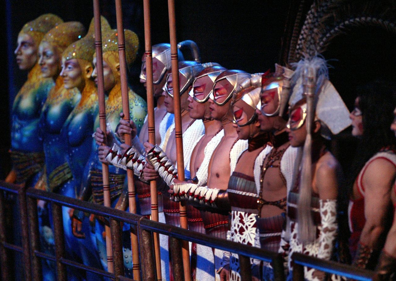 Cast members in various costumes are seen during the closing moments of the show in February 2005.  